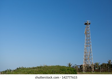 Rotating Lighthouse Beacon On An Aluminium Lattice Tower, Fitted With A Triangular Daymark.