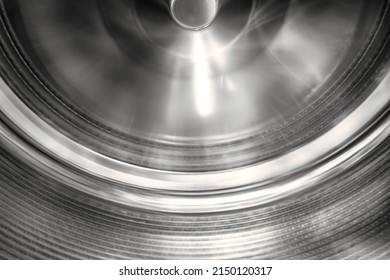 Rotating steel drum of a washing machine from the inside.