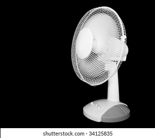 Rotating White Desk Fan Isolated On Black