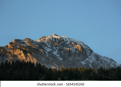 The 'Rotelstein' Mountain In The Austrian Alps At Sunset Covered In Snow