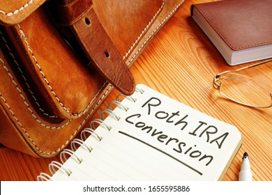 Roth Ira Conversion Memo Near Retro Briefcase And Glasses.