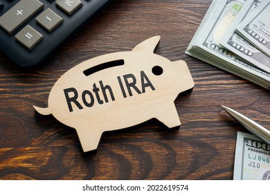 Roth IRA Retirement Plan And Piggy Bank.