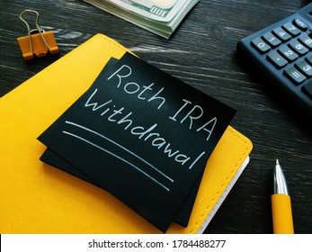 Roth IRA Withdrawal Words On A Black Page.