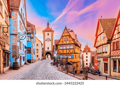 Rothenburg ob der Tauber, Bavaria, Germany. Plonlein street with city gates at sunrise. - Powered by Shutterstock