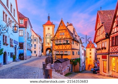 Rothenburg ob der Tauber, Bavaria, Germany. Medieval town of Rothenburg at night. Plonlein(Little Square) and the two towers of the old city wall.