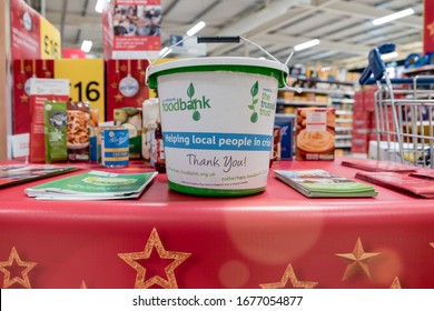 ROTHERHAM, UK – NOVEMBER 22, 2019: A Charity Money Bucket For Donations At The National Food Bank Collection For Trussell Trust Foodbanks