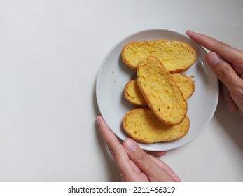 Roti Bagelen. Made From Sweet Bread That Is Spread With Margarine Or Buttercream, Then Dried By Baking. Authentic Snack From Purworejo, Central Java, Indonesia