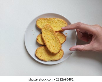 Roti Bagelen. Made From Sweet Bread That Is Spread With Margarine Or Buttercream, Then Dried By Baking. Authentic Snack From Purworejo, Central Java, Indonesia