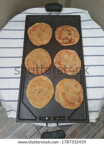 Roti Canai, bread is a type of flatbread with Indian influence, which is commonly found in Indonesia. This bread can be found in mamak outlets in Singapore or in Aceh and West Sumatra restaurants in I