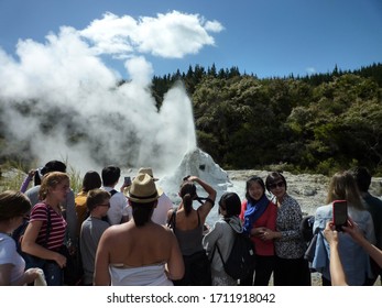 Rotorua, New Zealand - 12 30 2019: A Crowd Of A Lot Of People Waiting For The Show Of Lady Knox Geyser In Rotorua Geothermal Wonderland Park, In Order To Take Pictures And Selfie