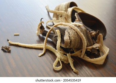 Rotten Banana Peel On Wood Table. Photo Can Be Used For The Concept Of The Benefits Of Banana Peel.