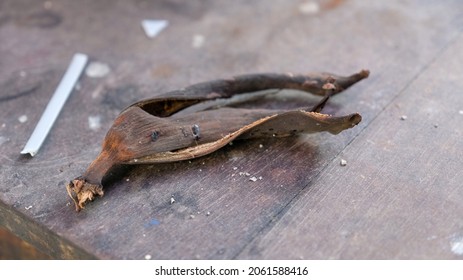 Rotten Banana Peel On A Wooden Table