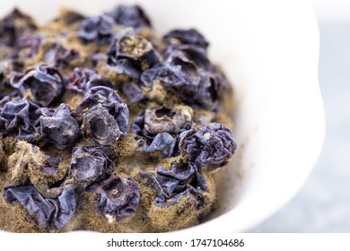 Rotten Berries In The White Bowl