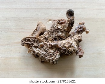 Rotten Ginger On Wooden Background