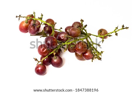 Rotten red grapes isolated on white background