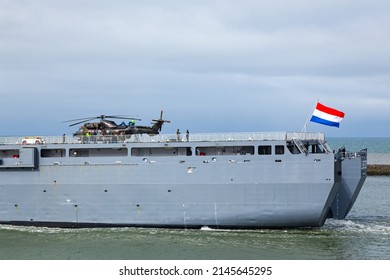Rotterdam, Netherlands - 03.20.2021 - The Dutch warship HNLMS Rotterdam with a helicopter on board is moving in the bay of Rotterdam.