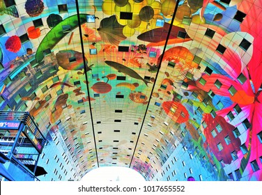 Rotterdam, Netherlands - August 24, 2016: the colourful painted arch ceiling of the Markthal - famous market hall in central Rotterdam