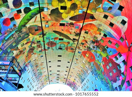 Rotterdam, Netherlands - August 24, 2016: the colourful painted arch ceiling of the Markthal - famous market hall in central Rotterdam