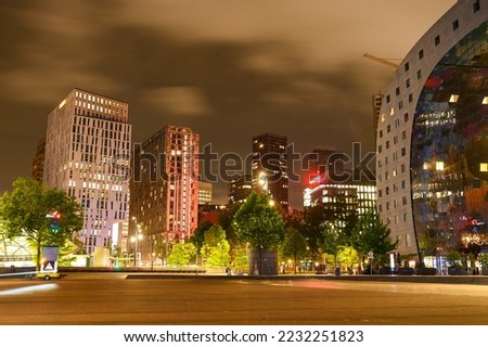 Rotterdam, Netherlands: City centre by night. Modern buildings. Market Hall.