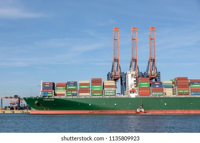 ROTTERDAM, THE NETHERLANDS - FEBRUARY 16, 2018: The Large Container Ship Theseus Moores At The Euromax Terminal At The Maasvlakte, Port Of Rotterdam On February 16, 2018.