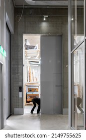 Rotterdam, The Netherlands - March 31, 2022: Open High Storage Door With Legs Sticking Out In Boijmans Van Beuningen Art Depot