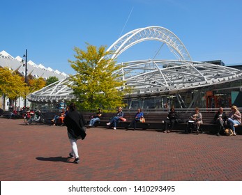 Rotterdam, Netherlands - May, 22, 2019: Disc Shaped Overhead Steel Structure Of Station Blaak In The Center Of Rotterdam. On The Background Are The Roofs Of The Cube Houses. 