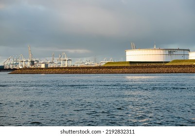 Rotterdam, Netherlands - November 22 2021 : A Combination Of Green And Fossil Energy, Wind Turbines And Fossil Fuel