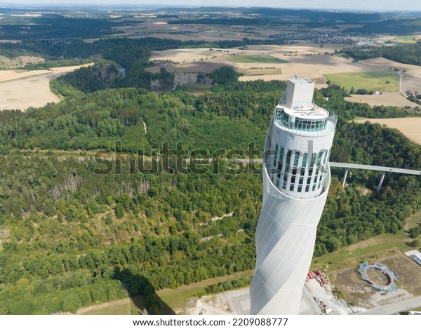 Rottweil, 15th of August 2022, Germany. The TK
Elevator Test Tower is an elevator test tower. 246 meters or 807
feet high. high speed elevator test chamber building. Aerial drone
overhead view.