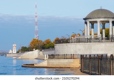 Rotunda And Lighthouse On The Embankment Of The City Of Blagoveshchensk, Russia In Autumn 2021. Increased Water Level In The Amur River After The Summer Flood. Yellow Foliage Of Trees In A City Park.