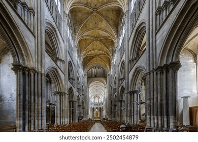 ROUEN, NORMANDY, FRANCE - 2024: interior of Notre Dame Cathedral, nave and central altar - Powered by Shutterstock