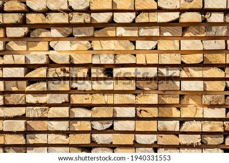 Rough 2x4 spruce and pine SPF lumber piled at a sawmill