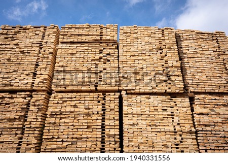 Rough 2x4 spruce and pine SPF lumber piled at a sawmill
