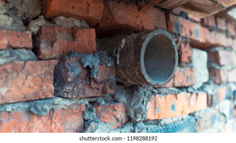 Rough brick and pipe