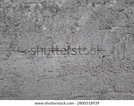 Rough cement plaster wall surface texture background.