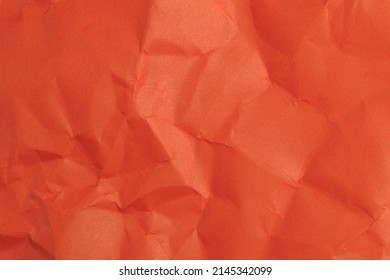 Rough crumpled texture surface of retro old vintage classic grunge paper. Background or backdrop. Design blank. Bright red.