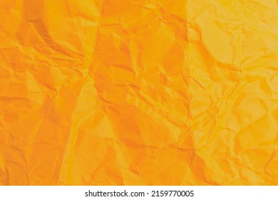 Rough crumpled texture surface of retro old vintage classic grunge paper. Background or backdrop. Design blank. Vivid orange