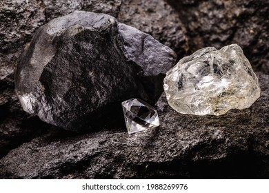 Rough Diamond Next To A Cut Diamond, In A Coal Mine, Concept Of Mining And Mineral Extraction