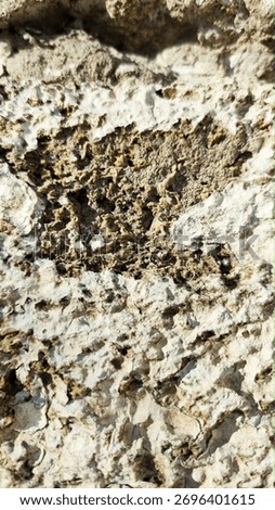 Rough eroded stone texture with natural cracks