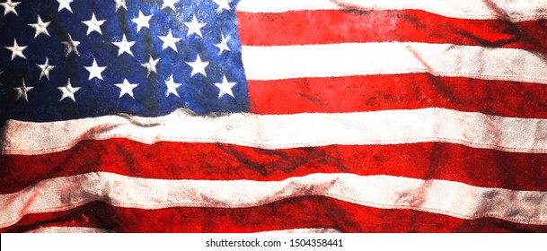 Rough faded US American flag background or Patriotic wallpaper