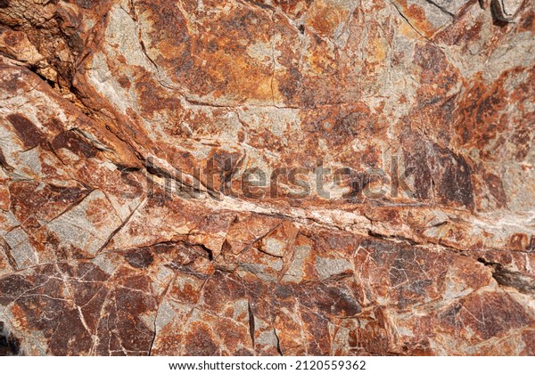 Rough granite stone surface for background,\
texture. High quality\
photo