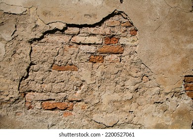 Rough Grunge Background Of Destroyed Old Brick Wall Of Building Close Up. Decay Plaster On Brick Wall. Texture With Space For Design