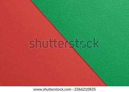 Rough kraft paper background, paper texture red green colors. Mockup with copy space for text
