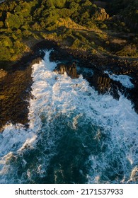 Rough Ocean Water Around The Rocky Coastline.