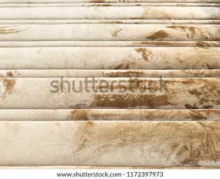 Rough old brown leather background.