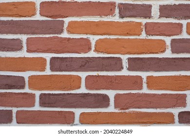 Rough Old Porous Bricks With White Grout. Texture Surface Wall Background