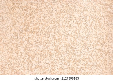 Rough plastered surface. Beige peach abstract background with heterogeneous texture - Shutterstock ID 2127398183