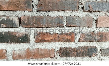Rough red brickwork texture backdrop.

Detailed close-up of an old, weathered red brick wall. The horizontal bricks display natural imperfections, cracks, and rough textures from aging. Ideal for construction branding, realistic 3D texturing, historical projects, and rustic textured wallpapers.