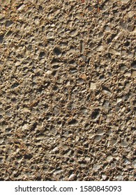 A rough rock surface with patterns