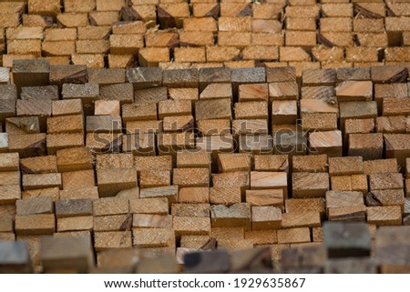 
rough sawn timber treated pine stacked hard wood board saw cut construction lumber carpentry, building, bush craft, woodcraft, interior exterior design materials background