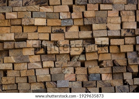 
rough sawn timber treated pine stacked hard wood board saw cut construction lumber carpentry, building, bush craft, woodcraft, interior exterior design materials background